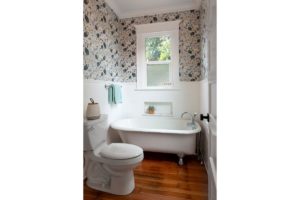 Craftsman bathroom with whimsical wallpaper